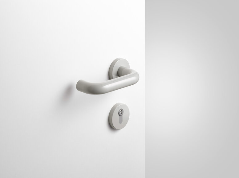 Béquille de porte HEWI gris roche Béquille de porte avec rosace de clé en polyamide de couleur gris roche