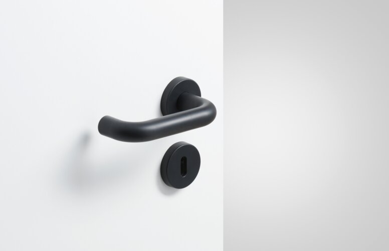 Béquille de porte HEWI noir profond mat Béquille de porte avec rosace de clé en couleur noir profond mat en polyamide