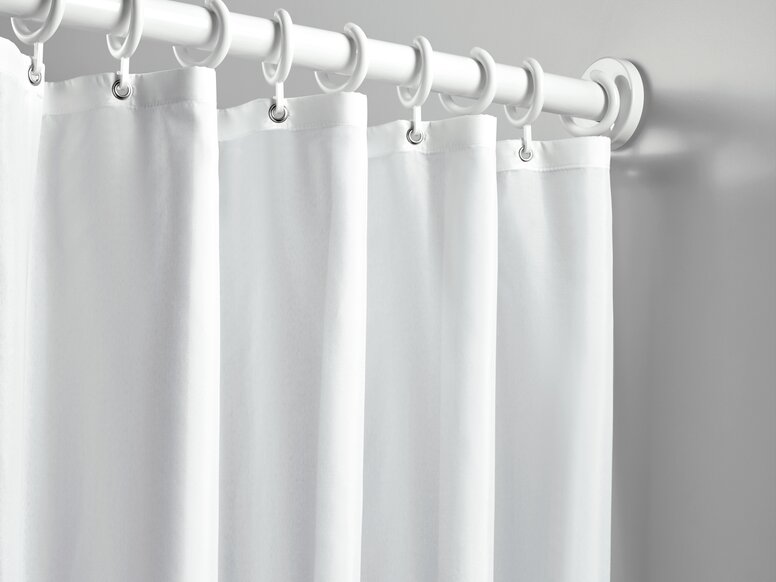 Shower curtain on a shower rail white