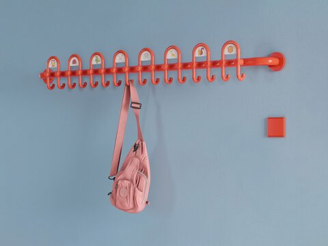 Colourful kindergarten equipped with fittings and wardrobe in the colour orange
