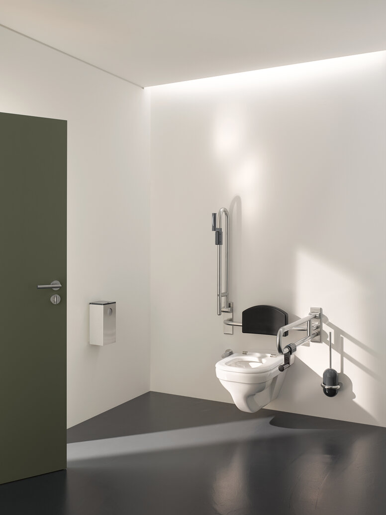 HEWI barrier-free WC Barrier-free WC in public areas equipped with folding support handles, backrest and toilet brush
