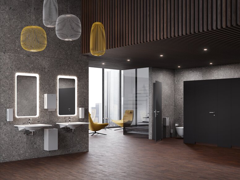 Badezimmer mit Seifenspender und Papierhandtuchhalter